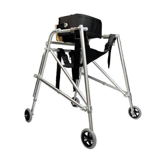 Silver walker with wheels on a gray floor against a gray wall