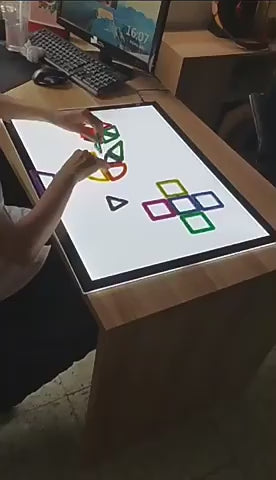 Load video: MORECARE Illuminating Sensory Table Pad for Children with Cerebral Palsy